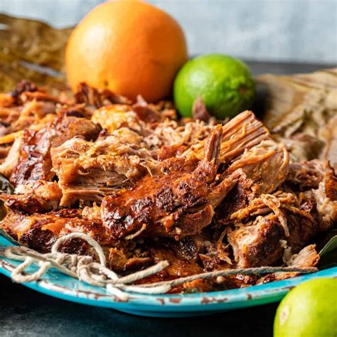  Cochinita Pibil:  A Yucatan Pork Dish Cooked Slowly for a Tender, Flavorful Fiesta in Your Mouth!