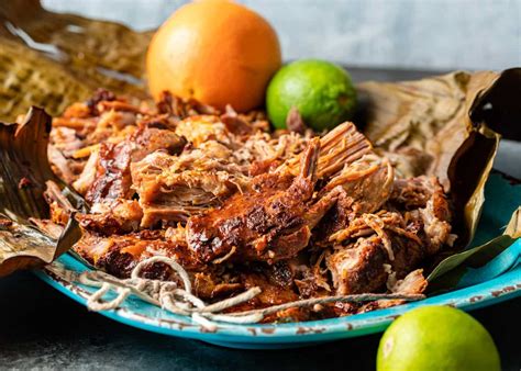   Cochinita Pibil:  Melt-in-your-Mouth Pork Indulgence Infused with a Tangy Citrus Symphony!